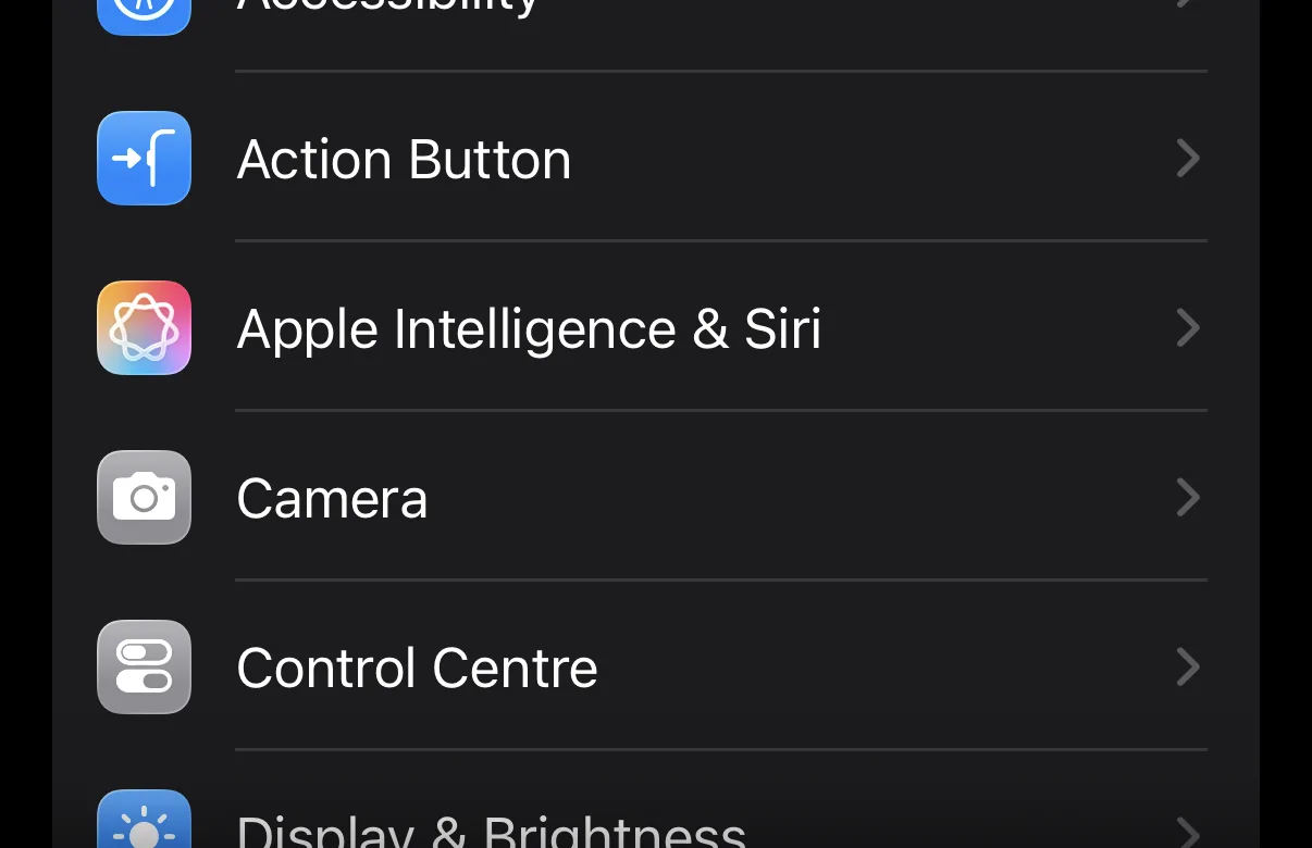 iPhone Settings list with the Action Button row